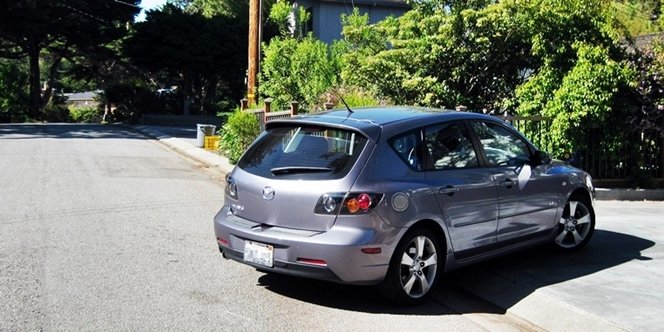 CLICK to continue: grey car pulling into street